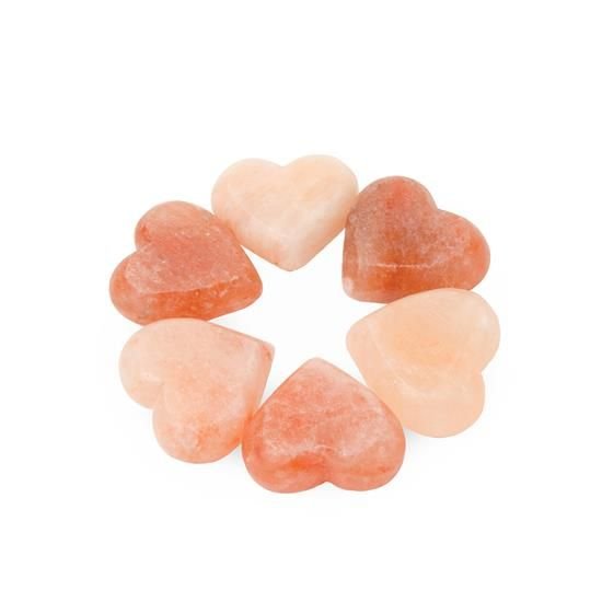Handcrafted heart shape pink salt stone with smooth polished surface carved from authentic Pakistani Himalayan salt