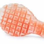 Hand-carved Himalayan pink salt foot scrub bar with grid texture on white background
