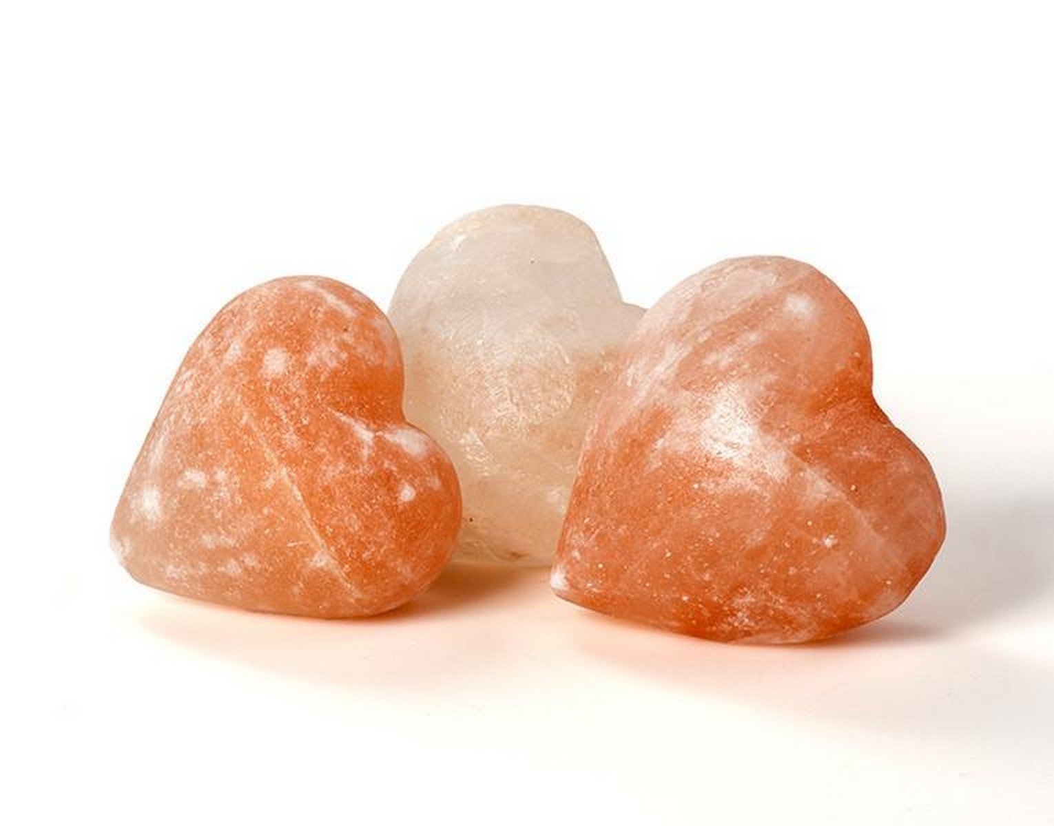 Heart-Shaped Himalayan Pink Salt Massage Stone - Natural Spa Therapy Handcrafted smooth heart-shaped Himalayan pink salt massage stone carved from pure rock salt crystal.