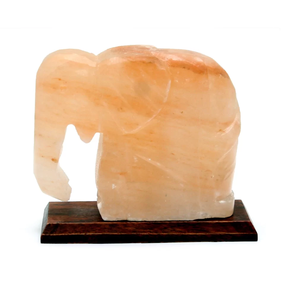 Handcrafted USB elephant shaped Himalayan pink salt lamp with carved trunk mounted on a dark rectangular wooden base.