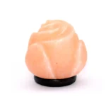 Handcrafted USB lotus shaped Himalayan pink salt lamp with carved petal layers mounted on a dark wooden base.