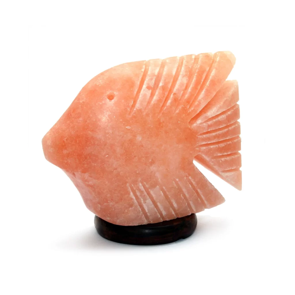 Handcrafted USB Fish Shaped Himalayan Pink Salt Lamp - Desktop Wellness Decor Handcrafted USB fish shaped Himalayan pink salt lamp with carved fin ridges mounted on a dark wooden base.