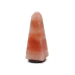 Handcrafted smooth pyramid-shaped Himalayan pink salt lamp mounted on a round dark wooden base.