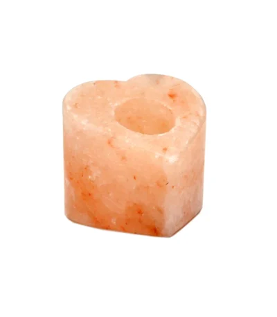Handcrafted heart-shaped Himalayan pink salt tealight candle holder carved from natural rock salt crystal.