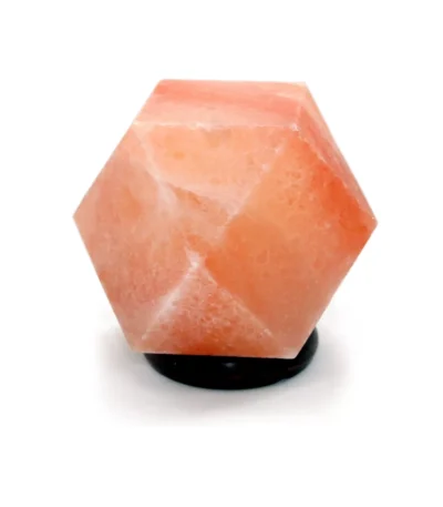 Handcrafted geometric hexagon shaped Himalayan pink salt lamp mounted on a round dark wooden base.