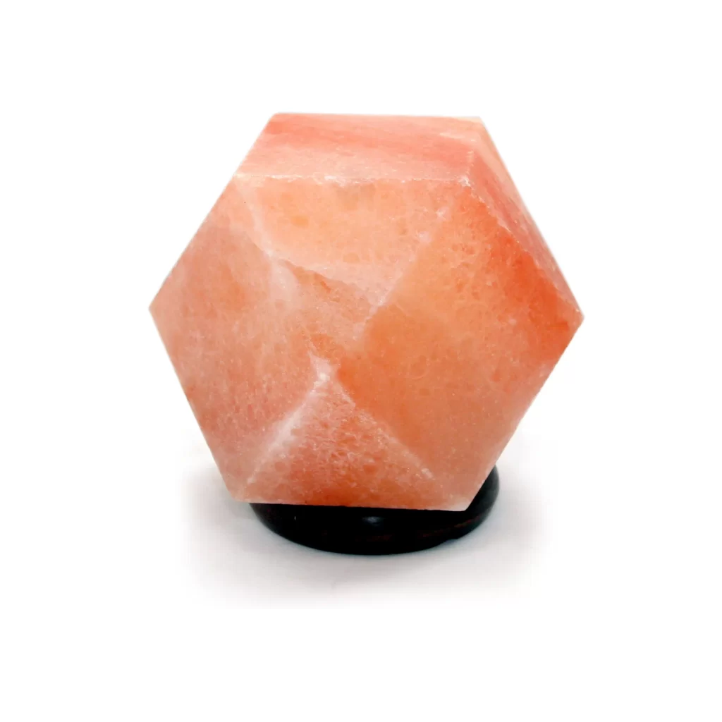 Handcrafted Hexagon Shaped Himalayan Pink Salt Lamp - Modern Wellness Decor Handcrafted geometric hexagon shaped Himalayan pink salt lamp mounted on a round dark wooden base.