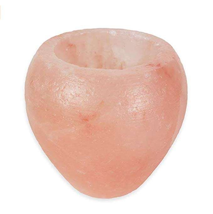 Handcrafted shell shape pink salt decoration piece with carved scallop ridges sculpted from pure Pakistani Himalayan rock salt