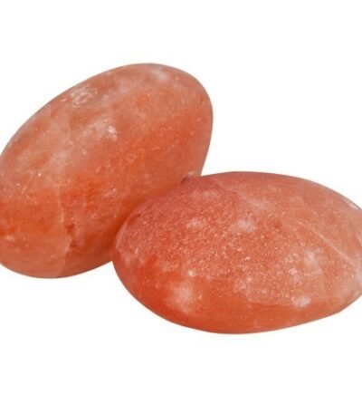 Two handcrafted smooth oval Himalayan pink salt massage stones carved from pure rock salt crystal.