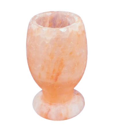 Handcrafted Himalayan pink salt shot glass with round pedestal base carved from natural rock salt crystal