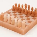 Handcrafted Himalayan pink salt chess set with solid mineral board and carved pink rock salt chess pieces